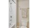 Modern bathroom featuring a white tiled shower and a neutral-toned patterned towel at 259 Tierra Verde Way, Bradenton, FL 34212