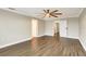 An airy bedroom with a ceiling fan and hardwood floors, leading to multiple rooms at 259 Tierra Verde Way, Bradenton, FL 34212