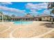 Community pool features lounge chairs under blue skies at 259 Tierra Verde Way, Bradenton, FL 34212