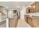 Bright kitchen with granite countertops, stainless steel appliances and spacious island at 259 Tierra Verde Way, Bradenton, FL 34212