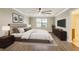 A calming primary bedroom features hardwood floors and a large window at 259 Tierra Verde Way, Bradenton, FL 34212