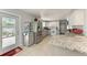 Well-lit kitchen with stainless steel appliances and granite countertops at 3053 Monica Pkwy, Sarasota, FL 34234