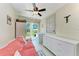 Bright sitting room with access to the backyard through sliding glass doors at 3053 Monica Pkwy, Sarasota, FL 34234
