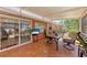 Enclosed porch with tile flooring, sliding doors, and outdoor views at 3053 Monica Pkwy, Sarasota, FL 34234