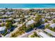 Home and neighborhood shown from the air, near scenic beaches and the Gulf of Mexico at 306 Poinsettia Rd, Anna Maria, FL 34216