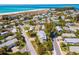 Aerial view of the home and the neighborhood on a beachside community at 306 Poinsettia Rd, Anna Maria, FL 34216