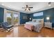Charming bedroom with a private balcony and beautiful natural light at 306 Poinsettia Rd, Anna Maria, FL 34216