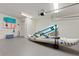 Spacious garage with ample storage for outdoor equipment such as surfboards, kayaks, and other beach gear at 306 Poinsettia Rd, Anna Maria, FL 34216