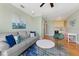 Comfortable living area with modern furniture, stylish decor, and hardwood floors at 306 Poinsettia Rd, Anna Maria, FL 34216