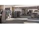 Bright community gym featuring modern exercise equipment, mirrored walls, and sleek flooring at 325 Golden Gate Pt # 1004, Sarasota, FL 34236