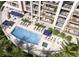 Luxury condo with a stylish swimming pool with lounge chairs and views from the balconies at 325 Golden Gate Pt # 1004, Sarasota, FL 34236