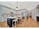 Stylish kitchen features a large island, stainless steel appliances, and elegant pendant lighting for a modern feel at 3533 Secluded Ct, Sarasota, FL 34240