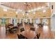 Spacious community clubhouse with high ceilings, chandeliers, and ample seating for events at 3790 Pinebrook Cir # 408, Bradenton, FL 34209