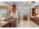 Well-equipped kitchen with wood cabinets, stainless steel appliances, and ample counter space at 3790 Pinebrook Cir # 408, Bradenton, FL 34209