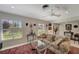 Cozy living area with natural light, charming decor, and comfortable seating, offering a relaxing atmosphere at 405 Park N Blvd, Venice, FL 34285