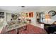 Bright living room featuring stylish furnishings, unique artwork, and an open layout perfect for relaxation and entertaining at 405 Park N Blvd, Venice, FL 34285