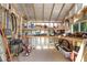 Interior of a shed with lots of storage shelves, tools, and clear organization at 405 Park N Blvd, Venice, FL 34285