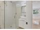 Modern bathroom features a glass shower, vanity, and updated fixtures at 4112 Swift Rd, Sarasota, FL 34231