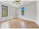 Spacious bedroom with hardwood floors and natural light, creating a bright and inviting atmosphere at 4112 Swift Rd, Sarasota, FL 34231