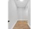Hallway features wood flooring and white trim throughout the space at 4112 Swift Rd, Sarasota, FL 34231