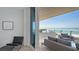 Relaxing balcony with ocean view, outdoor seating, and a built-in grill, perfect for entertaining or unwinding at 4651 Gulf Of Mexico Dr # 304, Longboat Key, FL 34228