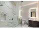 Bathroom featuring an enclosed glass shower, toilet, vanity, and modern fixtures at 4651 Gulf Of Mexico Dr # 304, Longboat Key, FL 34228