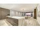 Open-concept kitchen with island, marble countertops, and seamless flow into the dining and living areas at 4651 Gulf Of Mexico Dr # 304, Longboat Key, FL 34228