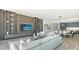 Open concept living room with modern built-ins, seamlessly connected to dining and kitchen areas at 4651 Gulf Of Mexico Dr # 304, Longboat Key, FL 34228