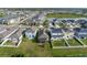 This single Gathering home sits among a community of homes near a large lake at 4767 Reisswood Loop, Palmetto, FL 34221