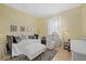 Charming bedroom featuring a daybed with decorative pillows and a stylish zebra-print rug at 5449 Downham Mdws, Sarasota, FL 34235