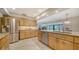 Spacious kitchen features stainless appliances and granite countertops at 5458 Golf Pointe Dr, Sarasota, FL 34243