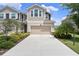 Charming townhome with a two-car garage, well-maintained landscaping, and a welcoming entrance at 5543 Pleasantview Ct, Bradenton, FL 34211