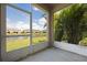 Screened lanai offers serene views of the pond and surrounding neighborhood at 5543 Pleasantview Ct, Bradenton, FL 34211