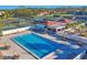 Aerial view of the community pool and tennis courts at 5578 Country Club Way, Sarasota, FL 34243
