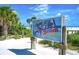 Iconic Siesta Beach sign proclaims #1 beach in USA on a sunny day in Sarasota, Florida at 5663 Midnight Pass Rd # 407, Sarasota, FL 34242