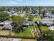 Sprawling backyard with lush green grass, a garden, and a privacy fence at 5704 2Nd Avenue Nw Dr, Bradenton, FL 34209