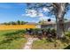 Spacious backyard featuring a fire pit area with seating, creating a perfect spot for outdoor gatherings and relaxation at 5704 2Nd Avenue Nw Dr, Bradenton, FL 34209