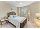 Cozy bedroom with carpet and comfortable bedding at 5810 Brandon Run, Bradenton, FL 34211