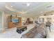 Open-concept living space provides seamless flow between the kitchen, dining area, and living room at 5810 Brandon Run, Bradenton, FL 34211