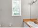 Bathroom with window and sink/vanity at 6418 Rosefinch Ct # 103, Lakewood Ranch, FL 34202