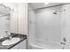 Well-lit bathroom featuring a shower/tub combo with white tile and a modern sink vanity at 6418 Rosefinch Ct # 103, Lakewood Ranch, FL 34202