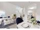 Bright, open-concept living room with modern decor and ample seating space at 6418 Rosefinch Ct # 103, Lakewood Ranch, FL 34202