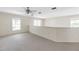 Upstairs loft with carpet flooring and natural light at 6418 Rosefinch Ct # 103, Lakewood Ranch, FL 34202
