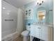 Charming bathroom features white subway tile, a decorative mirror, and a modern vanity at 6500 Flotilla Dr # 126, Holmes Beach, FL 34217