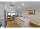 Open kitchen with island and view into the living and dining areas at 6500 Flotilla Dr # 126, Holmes Beach, FL 34217
