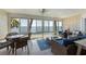 Bright sunroom with water views, wicker seating, and plenty of room to relax at 6500 Flotilla Dr # 126, Holmes Beach, FL 34217