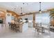 Spacious kitchen with an island, granite countertops, and white cabinetry at 6642 Oakland Hills Dr, Lakewood Ranch, FL 34202
