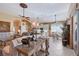 Open living space with a kitchen, dining area, and comfortable seating with lots of natural light at 6642 Oakland Hills Dr, Lakewood Ranch, FL 34202