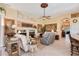 Inviting living room with fireplace, plush seating, elegant decor, and open layout at 6642 Oakland Hills Dr, Lakewood Ranch, FL 34202
