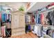 Walk-in closet with custom organizers, wire shelving, and plenty of storage for clothes at 6642 Oakland Hills Dr, Lakewood Ranch, FL 34202